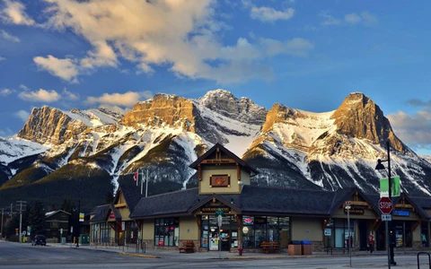 Downtown Canmore beneath the Three Sisters mountains