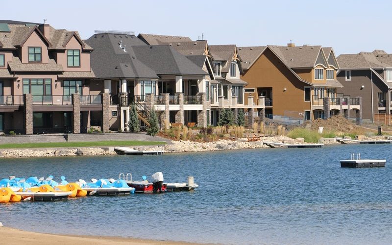Lakefront homes and beach in southeast Calgary